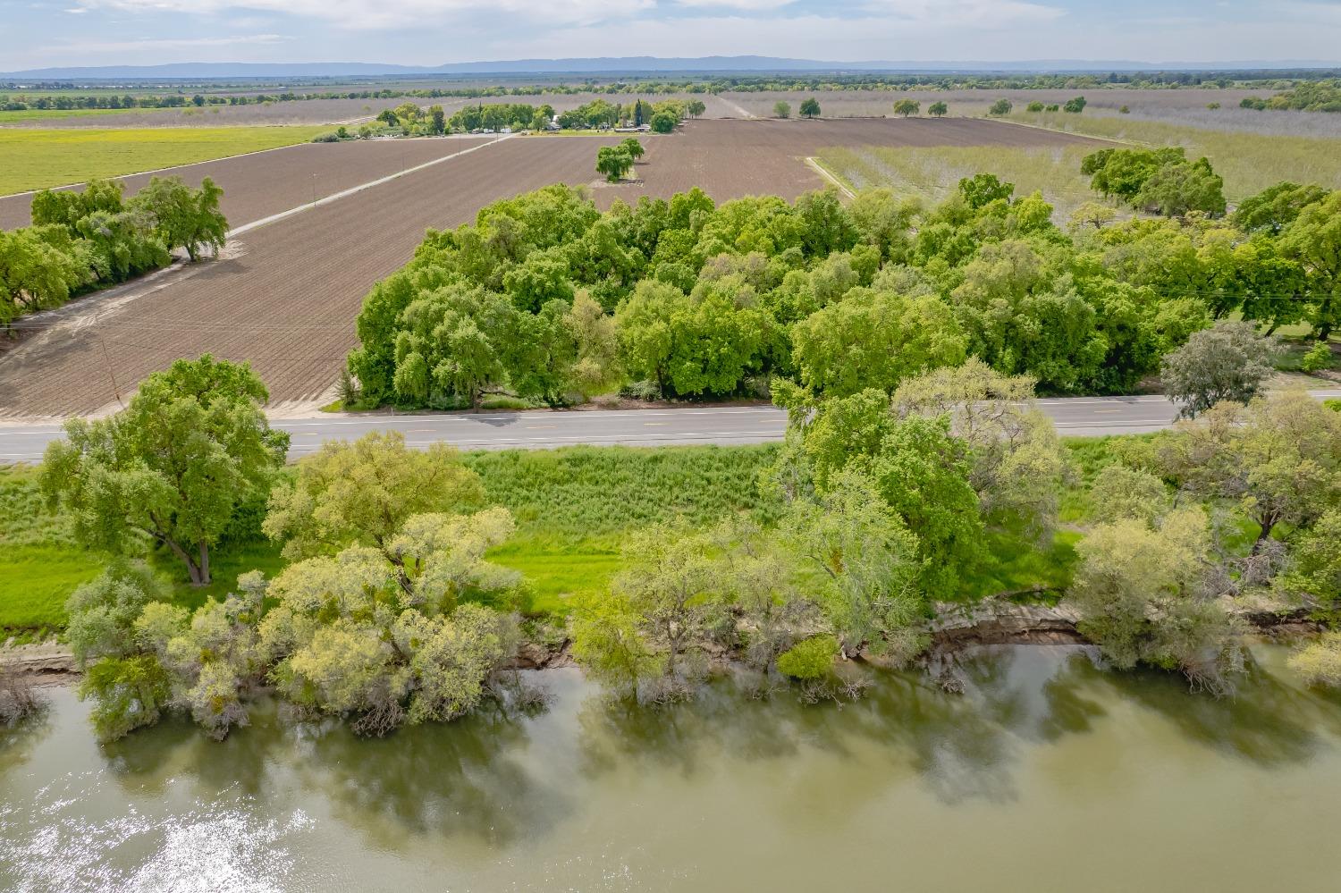 20660 Old River Road Woodland, CA 95776 - Photo 13 of 18 a view of a lake with a city view