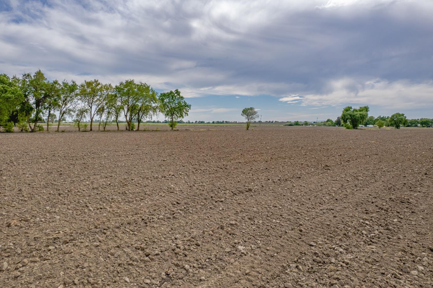 20660 Old River Road Woodland, CA 95776 - Photo 15 of 18 a view of beach and lake