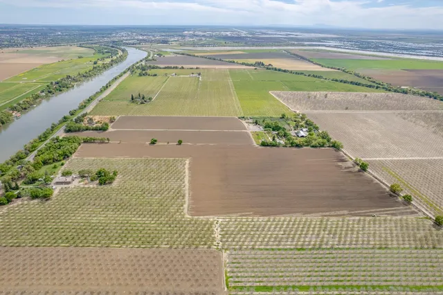 a view of a swimming pool and an outdoor space