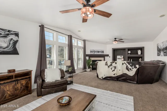 a bedroom with furniture and a fireplace