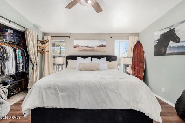 a bedroom with a bed and a walk in closet