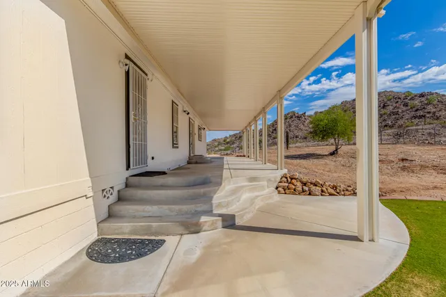 a balcony with view of ocean view