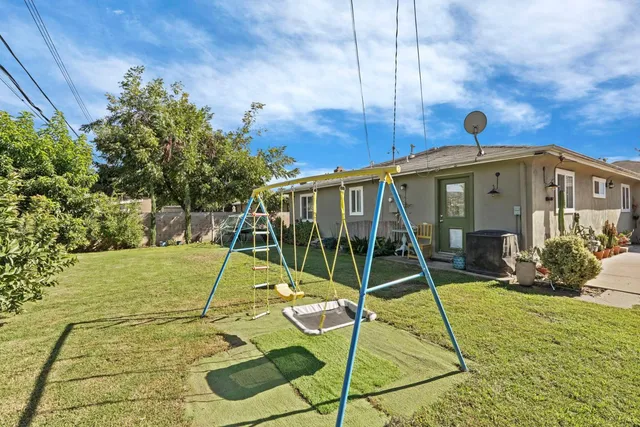 a view of a yard in front of a house