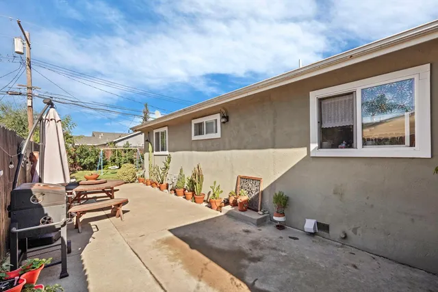 a front view of a house with patio