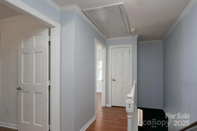 a view of hallway with walk in closet