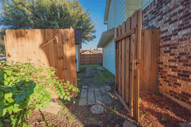 a house view with a garden space