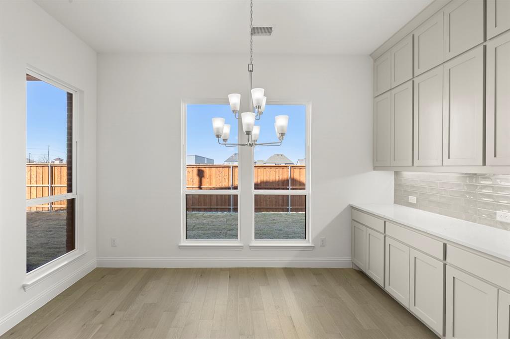 2006 Wickersham Road Rockwall, TX 75087 - Photo 13 of 33 a view of an empty room with a window