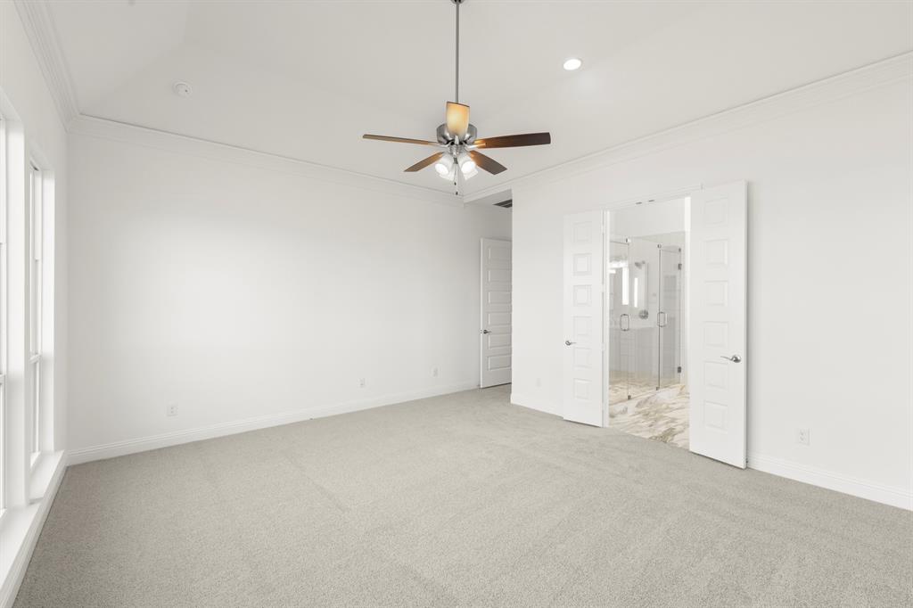 2006 Wickersham Road Rockwall, TX 75087 - Photo 16 of 33 an empty room with a ceiling fan and a window