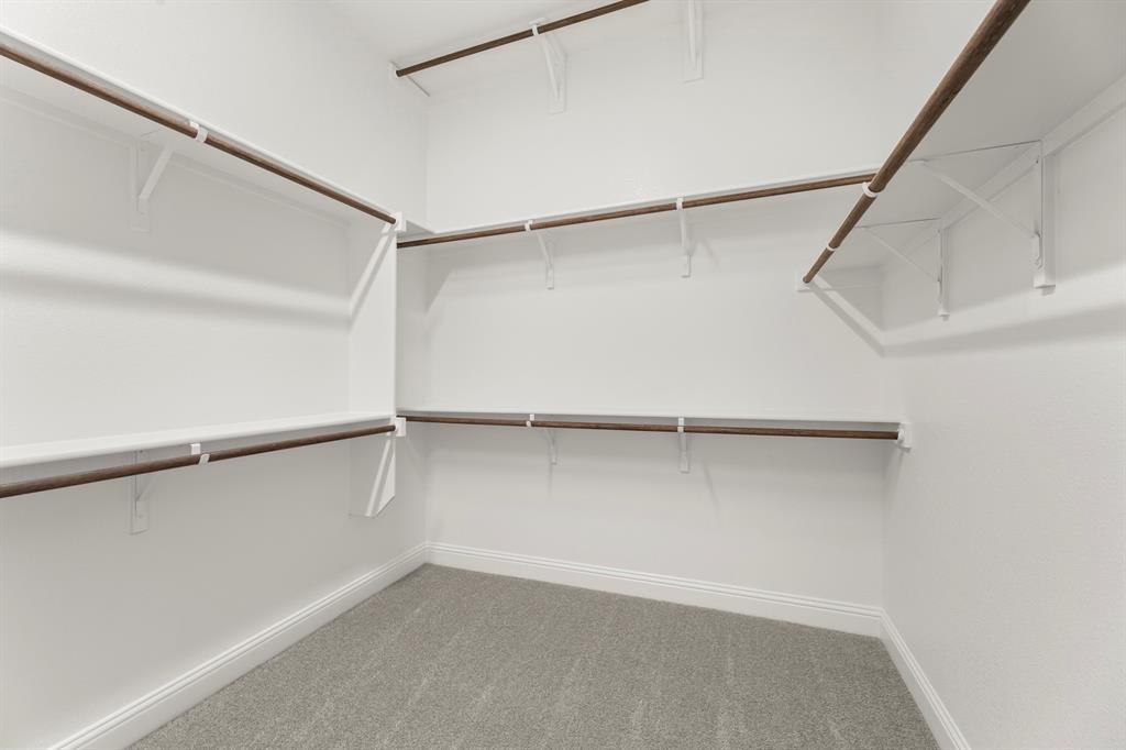 2006 Wickersham Road Rockwall, TX 75087 - Photo 21 of 33 a view of an empty walk in closet