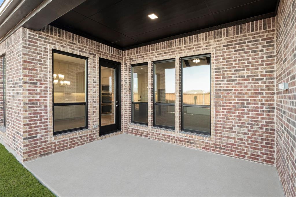 2006 Wickersham Road Rockwall, TX 75087 - Photo 25 of 33 a view of a brick house with front door