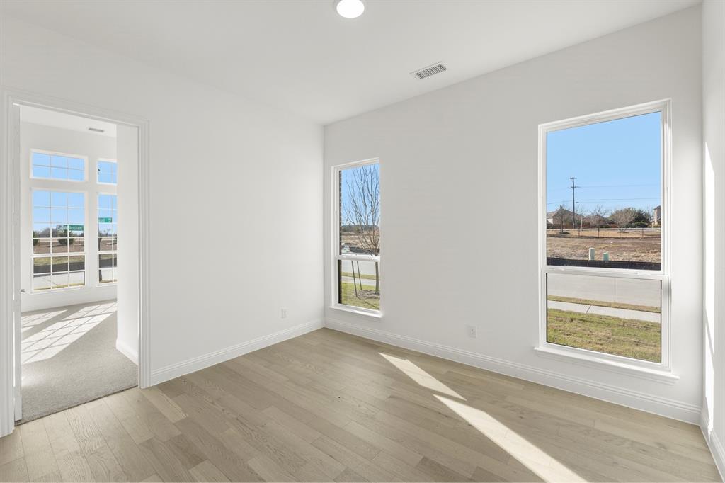 2006 Wickersham Road Rockwall, TX 75087 - Photo 5 of 33 a view of an empty room with a window