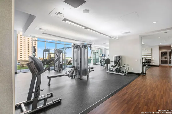 a view of a room with gym equipment