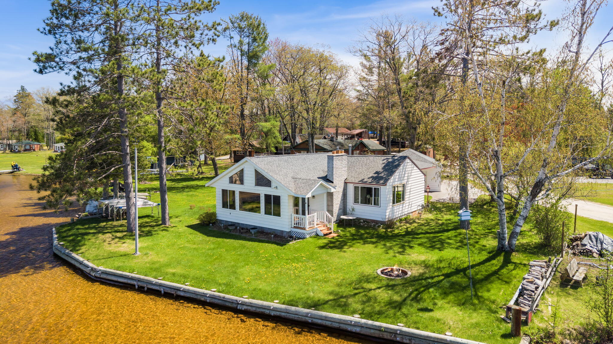 14296 Pointe Road Atlanta, MI 49709 - Photo 2 of 40 31-web-or-mls-DJI_20260521142401_0007_D