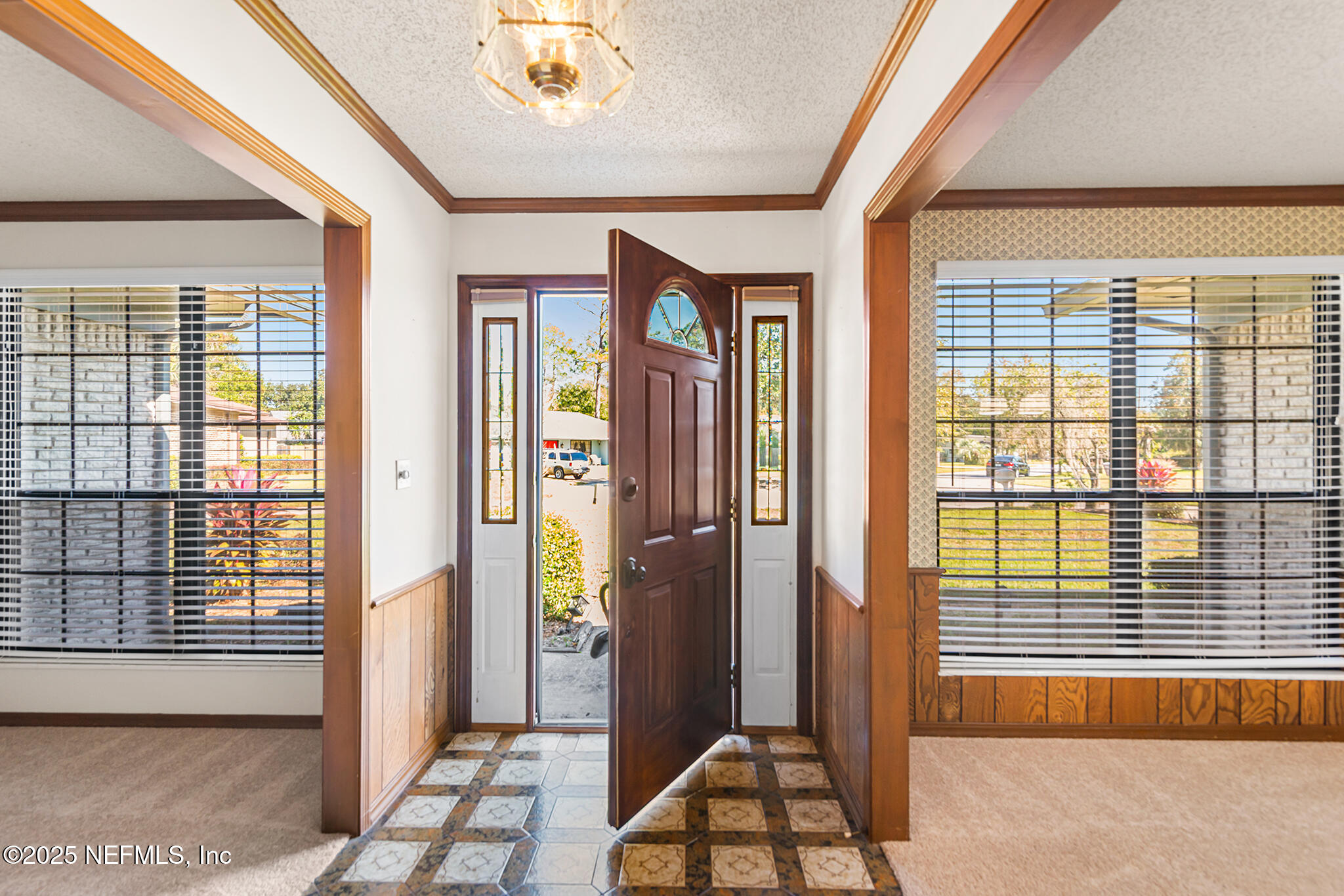 12850 Deep Lagoon Place West Jacksonville, FL 32246 - Photo 14 of 51 a view of a room that has a window and wooden floor