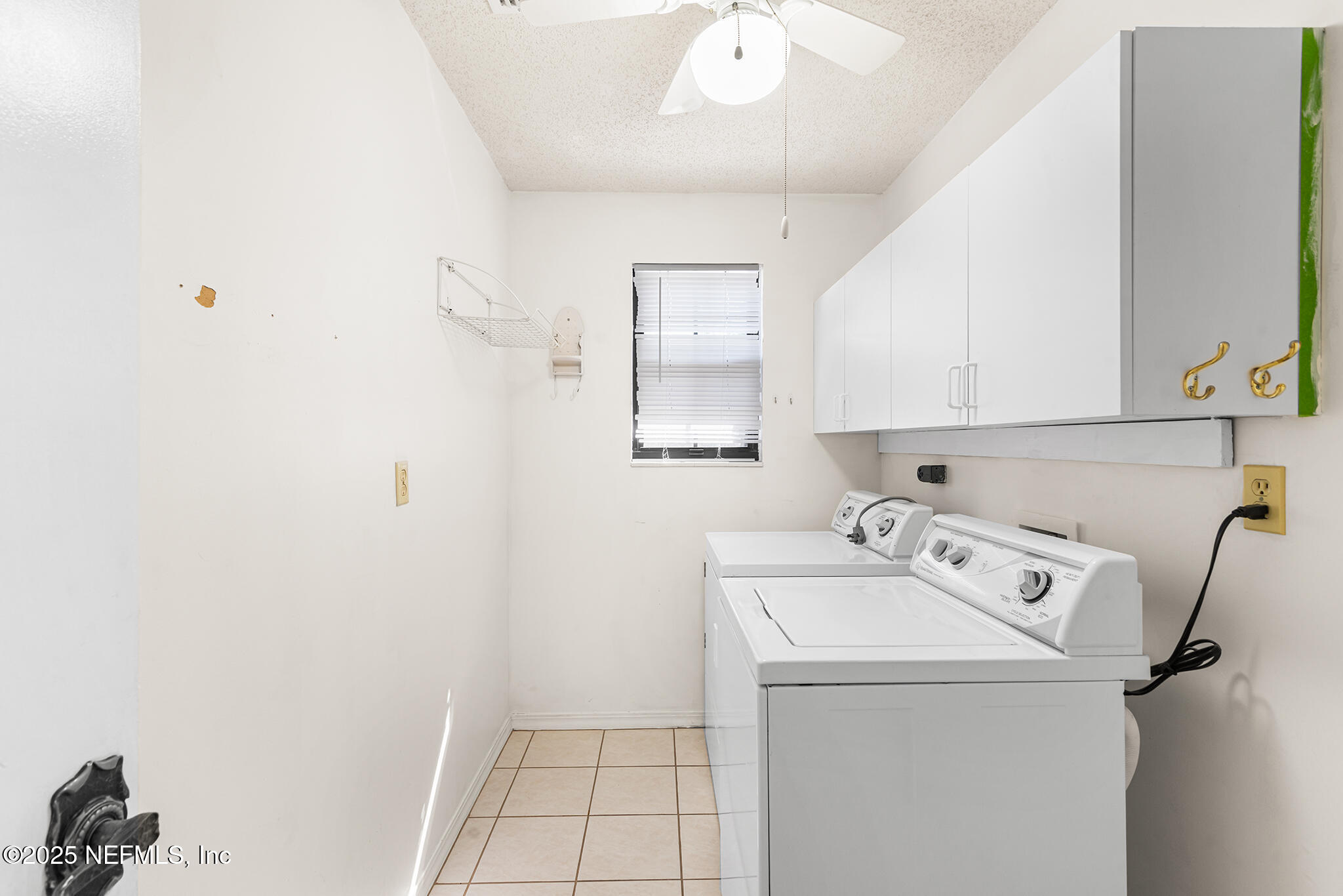 12850 Deep Lagoon Place West Jacksonville, FL 32246 - Photo 23 of 51 a utility room with dryer and washer