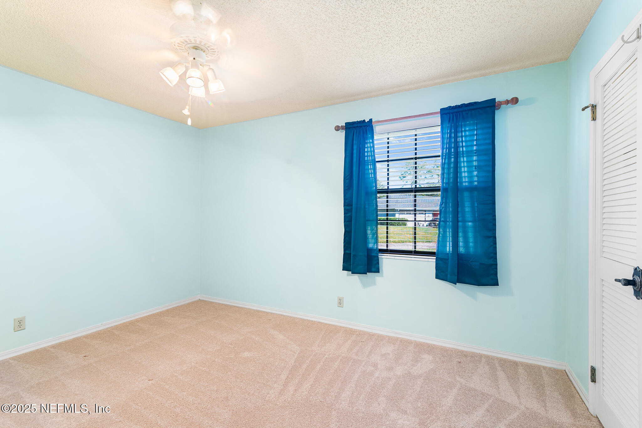 12850 Deep Lagoon Place West Jacksonville, FL 32246 - Photo 30 of 51 a view of an empty room with a window