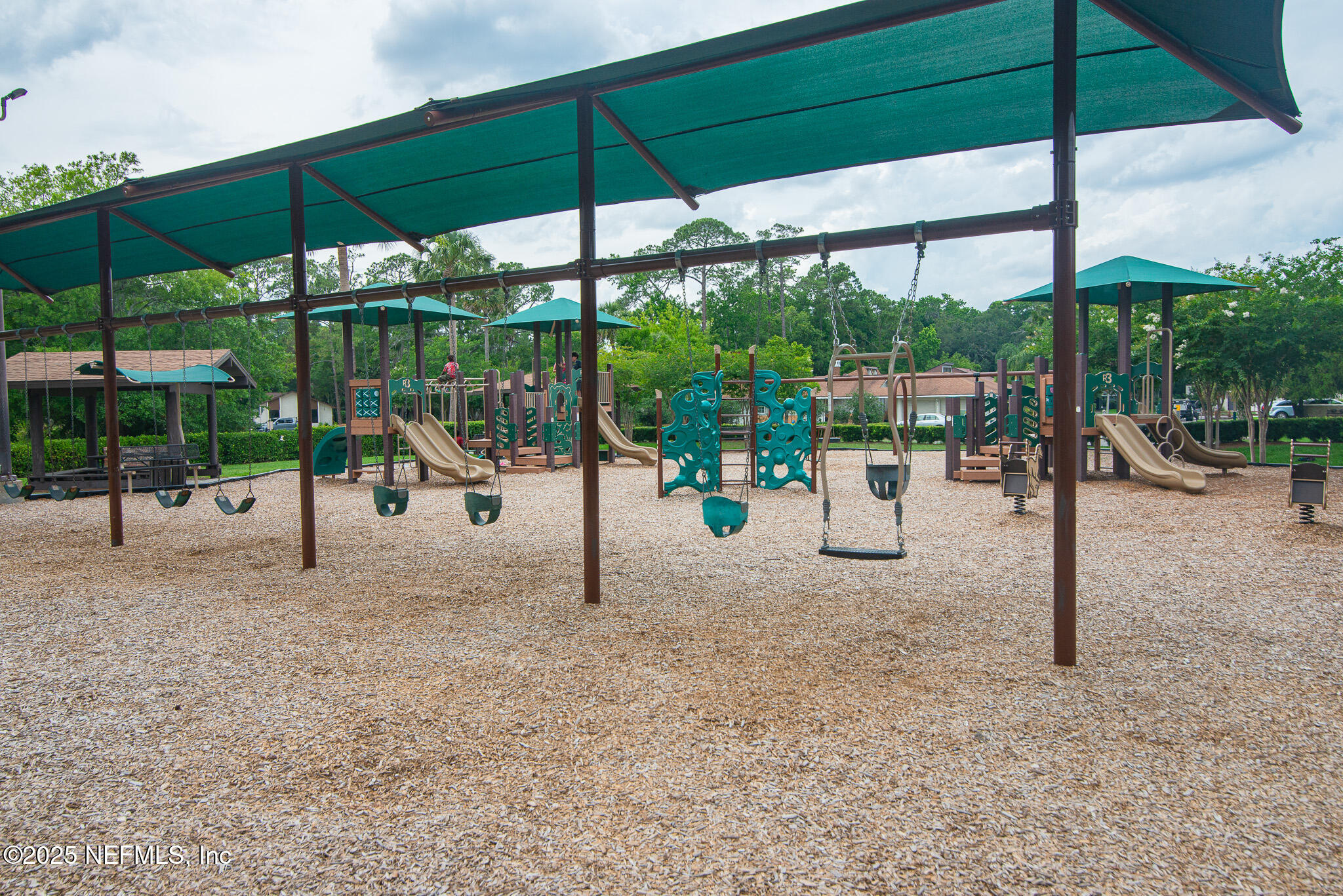 12850 Deep Lagoon Place West Jacksonville, FL 32246 - Photo 41 of 51 a view of a park with a slide