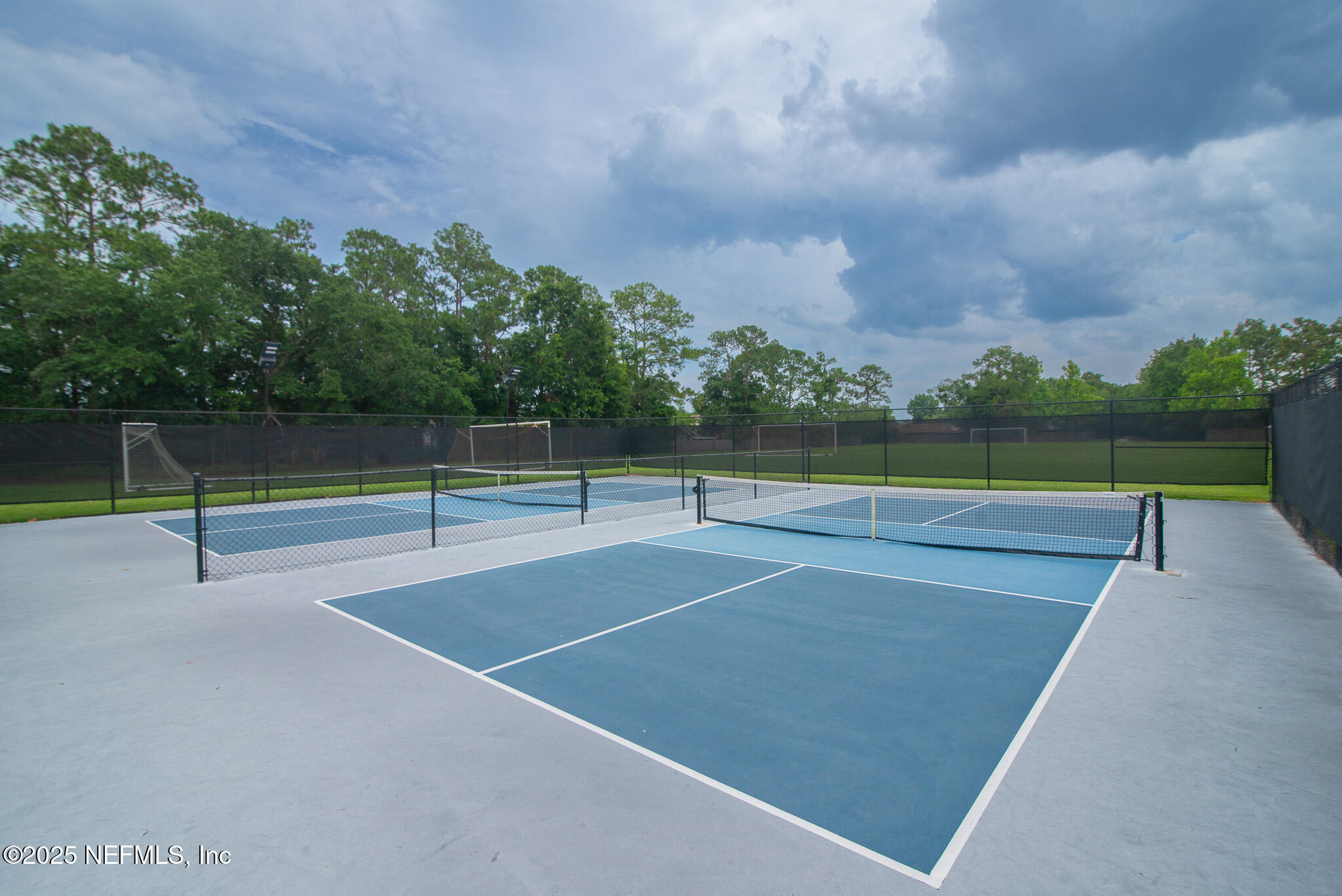 12850 Deep Lagoon Place West Jacksonville, FL 32246 - Photo 48 of 51 a view of a tennis court