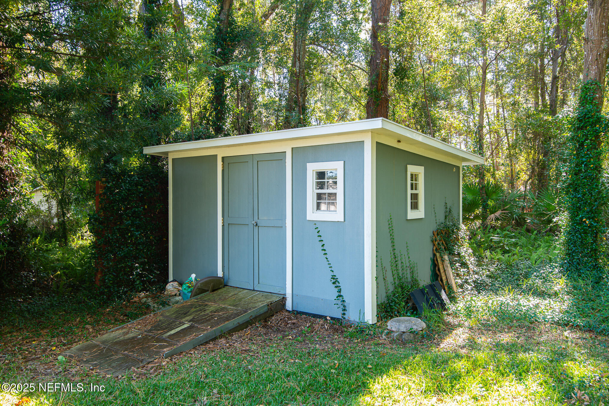 12850 Deep Lagoon Place West Jacksonville, FL 32246 - Photo 9 of 51 a view of a backyard of the house