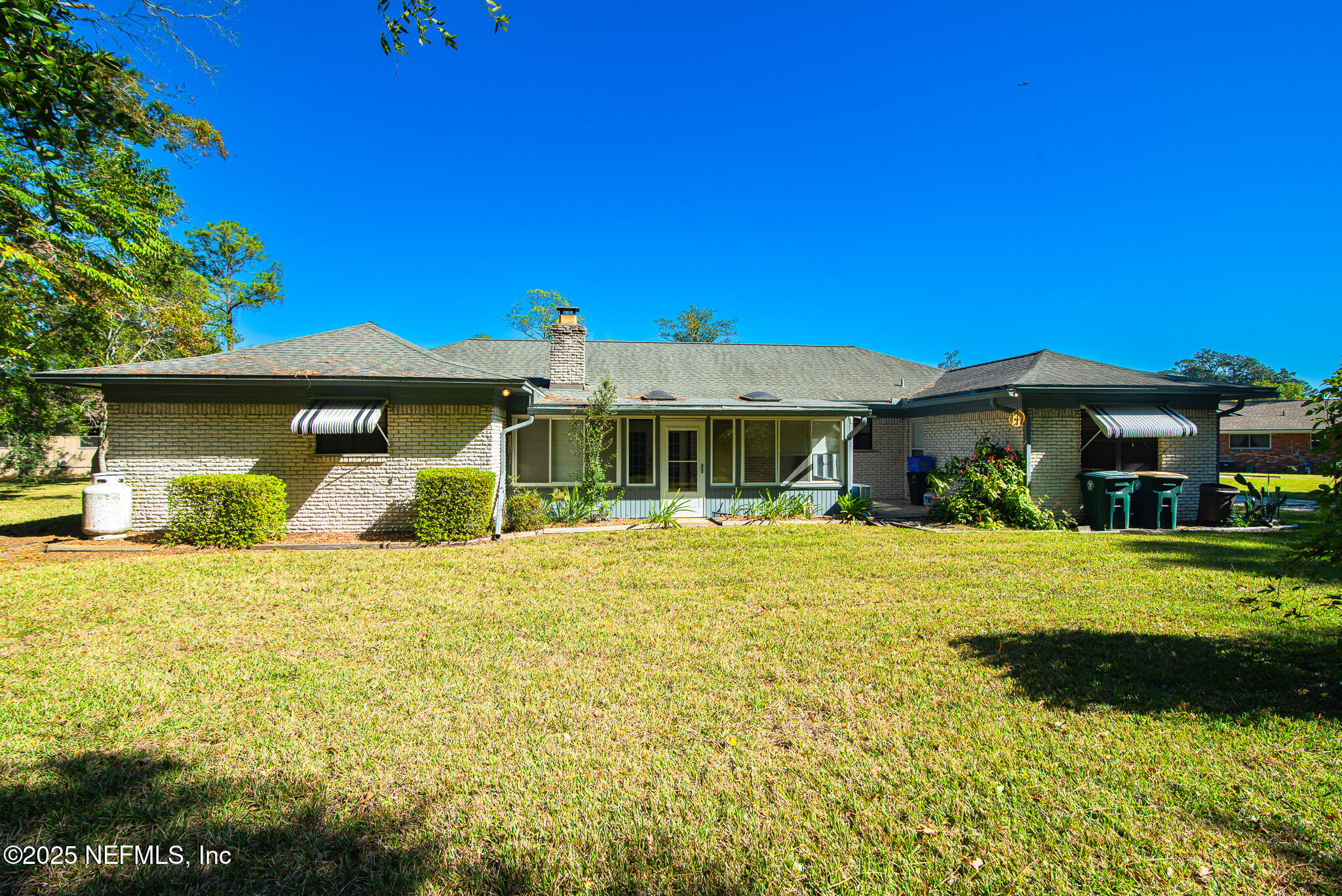 12850 Deep Lagoon Place West Jacksonville, FL 32246 - Photo 10 of 51 a front view of a house with a garden