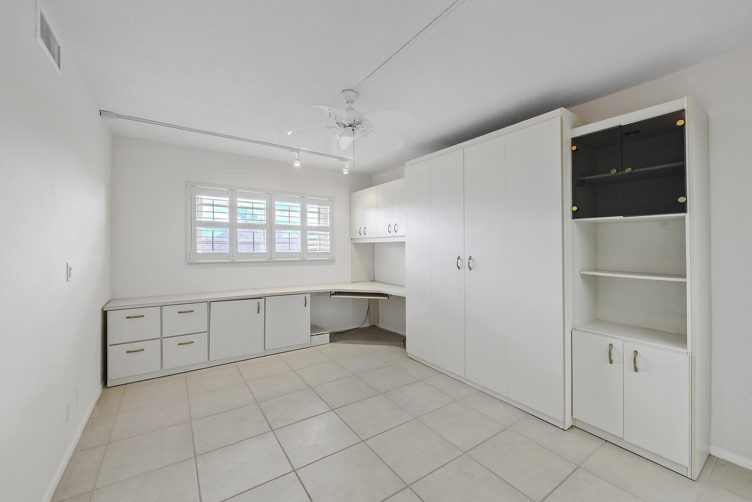 2871 North Ocean Boulevard, Unit F429 Boca Raton, FL 33431 - Photo 16 of 38 a large white room with windows