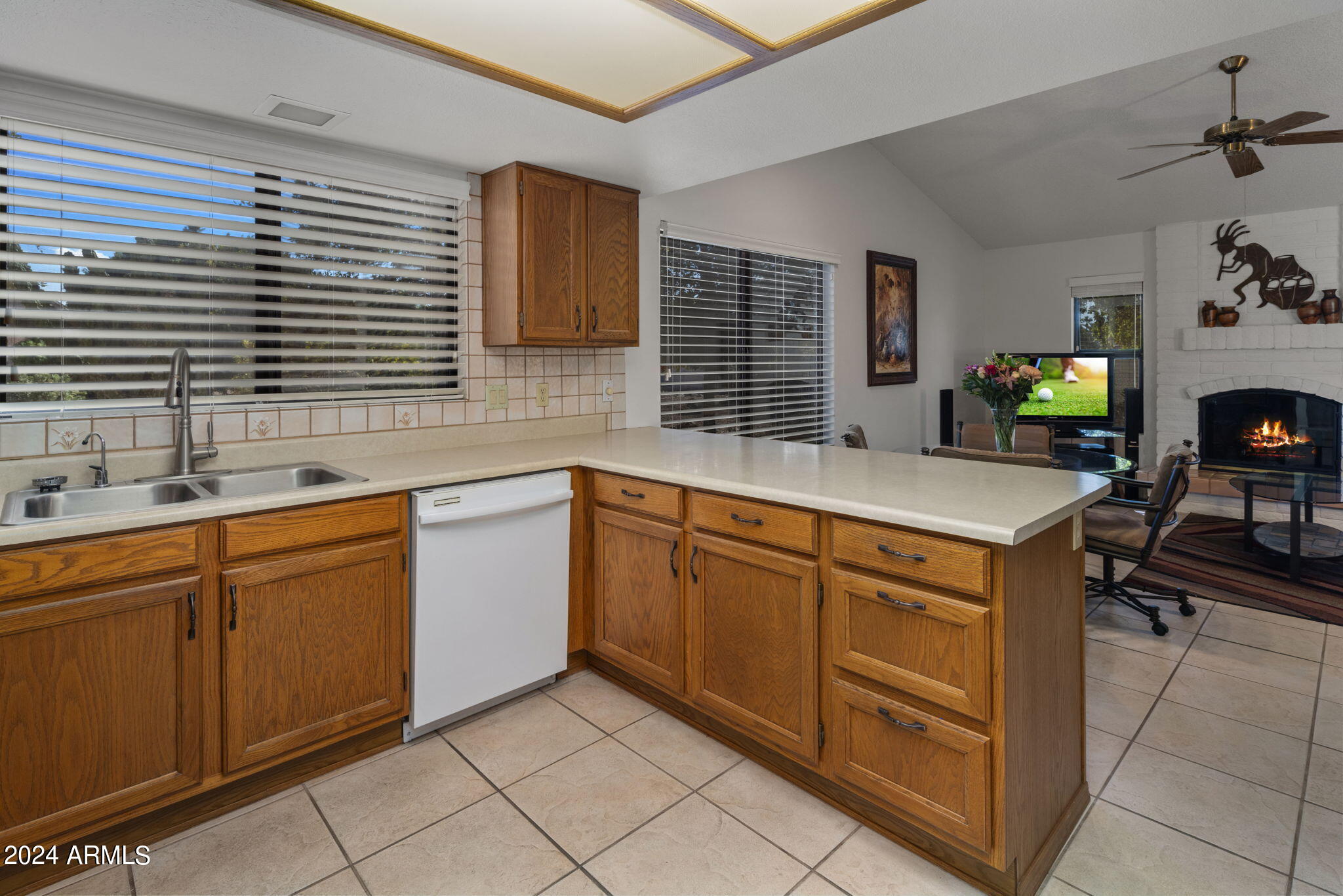9856 West Rimrock Drive Peoria, AZ 85382 - Photo 24 of 37 a kitchen with sink cabinets and window