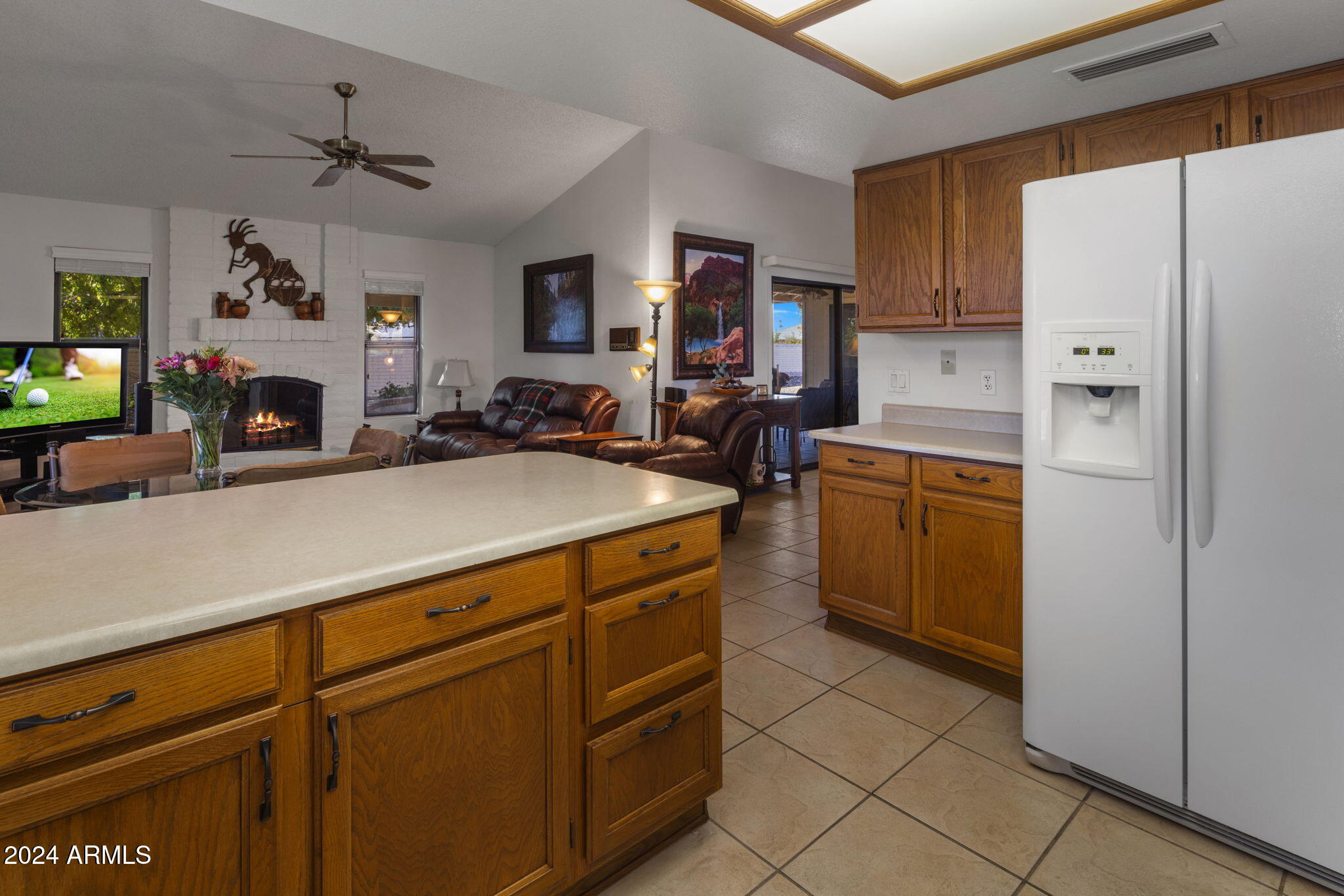 9856 West Rimrock Drive Peoria, AZ 85382 - Photo 25 of 37 a kitchen with a sink appliances and cabinets