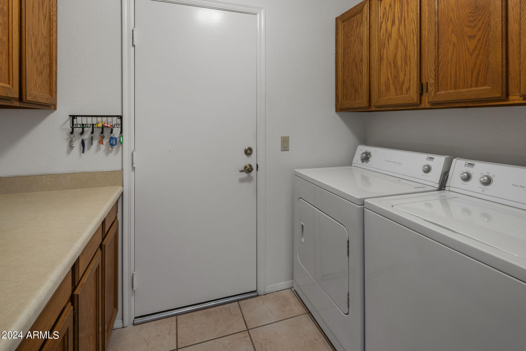 9856 West Rimrock Drive Peoria, AZ 85382 - Photo 33 of 37 a utility room with dryer and washer
