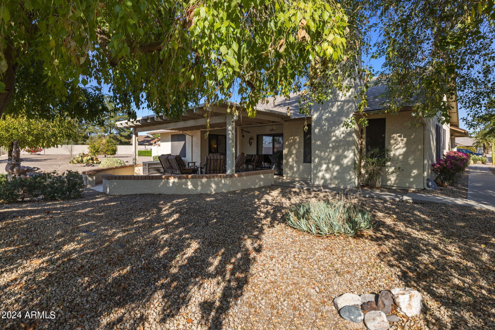 9856 West Rimrock Drive Peoria, AZ 85382 - Photo 8 of 37 a front view of a house with a yard