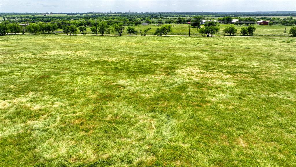1000 Goodnight Trail Perrin, TX 76486 - Photo 5 of 8 a view of an outdoor space and a yard