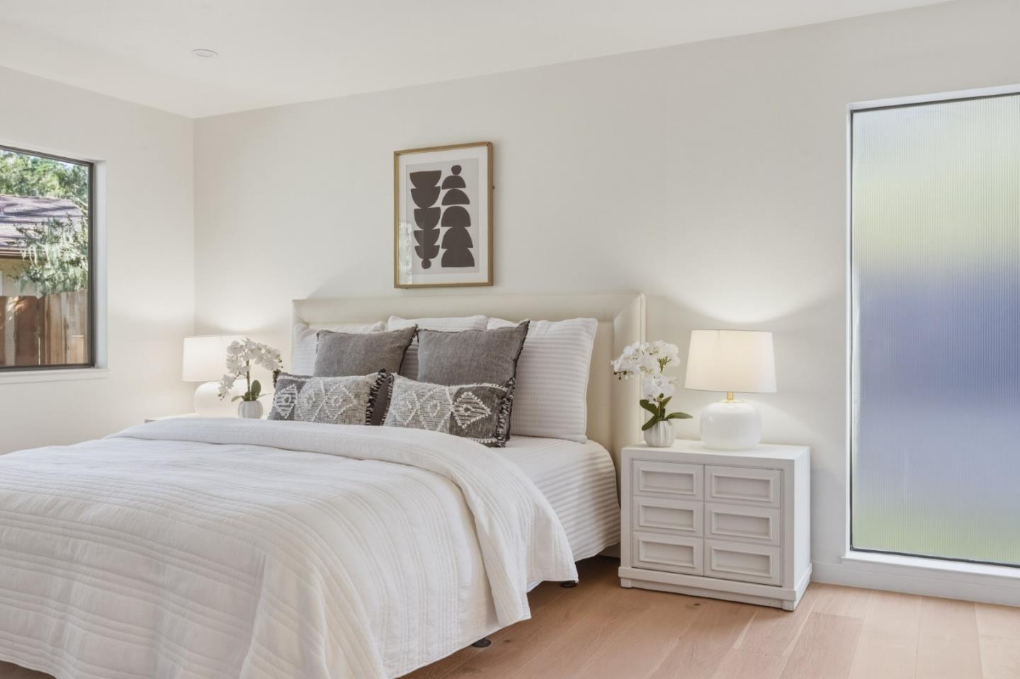 1171 Chaparral Road Pebble Beach, CA 93953 - Photo 15 of 20 a bedroom with a bed and a night stand