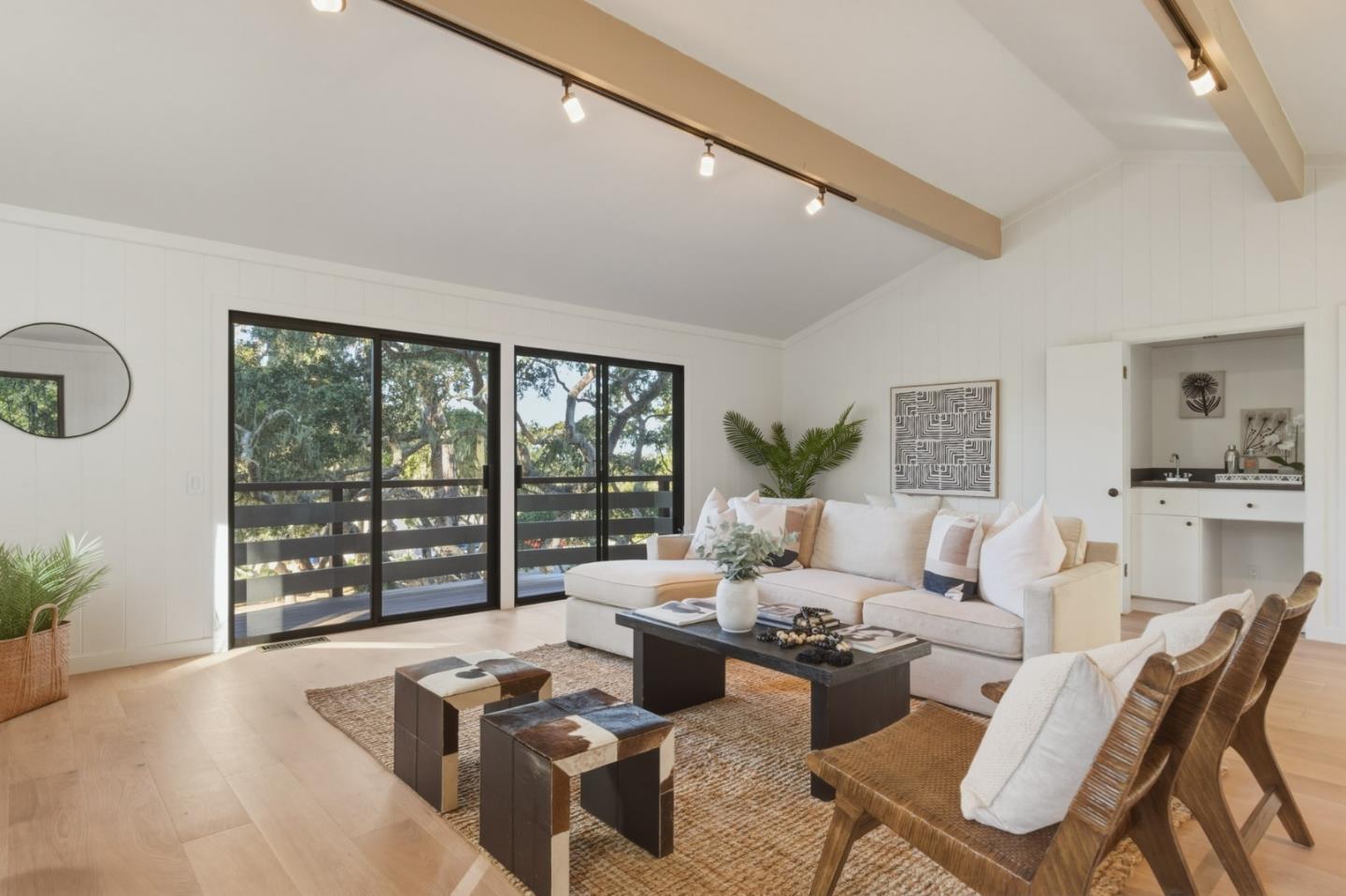 1171 Chaparral Road Pebble Beach, CA 93953 - Photo 18 of 20 a living room with furniture and large windows