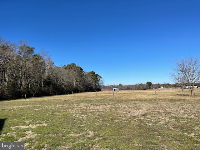 6794 Bent Pine Road Willards, MD 21874 - Photo 15 of 29 a view of an ocean and beach