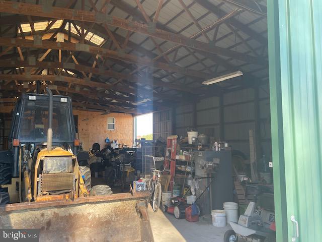6794 Bent Pine Road Willards, MD 21874 - Photo 21 of 29 a view of a entryway with a chandelier