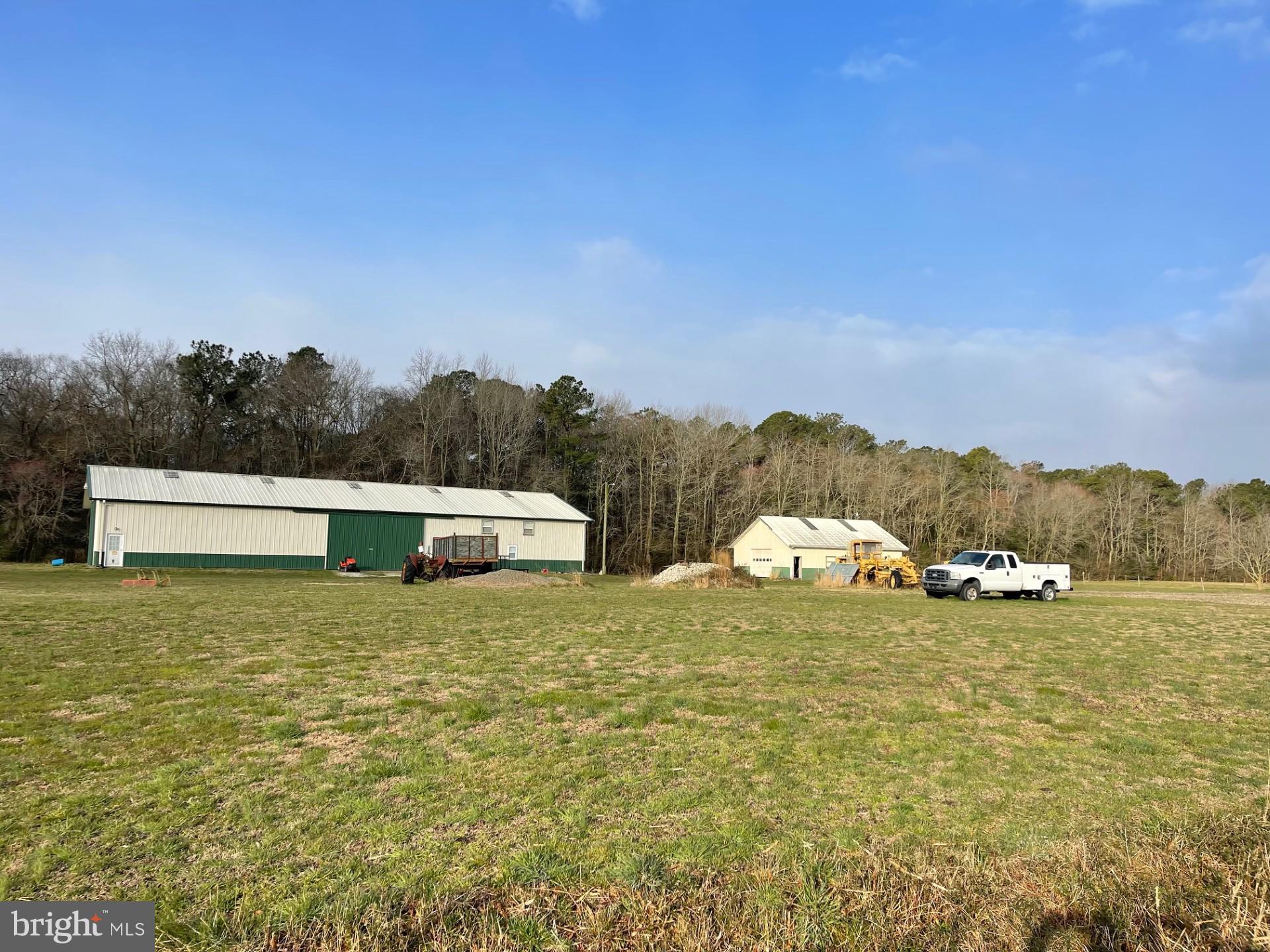 6794 Bent Pine Road Willards, MD 21874 - Photo 24 of 29 a view of a lake with sunset