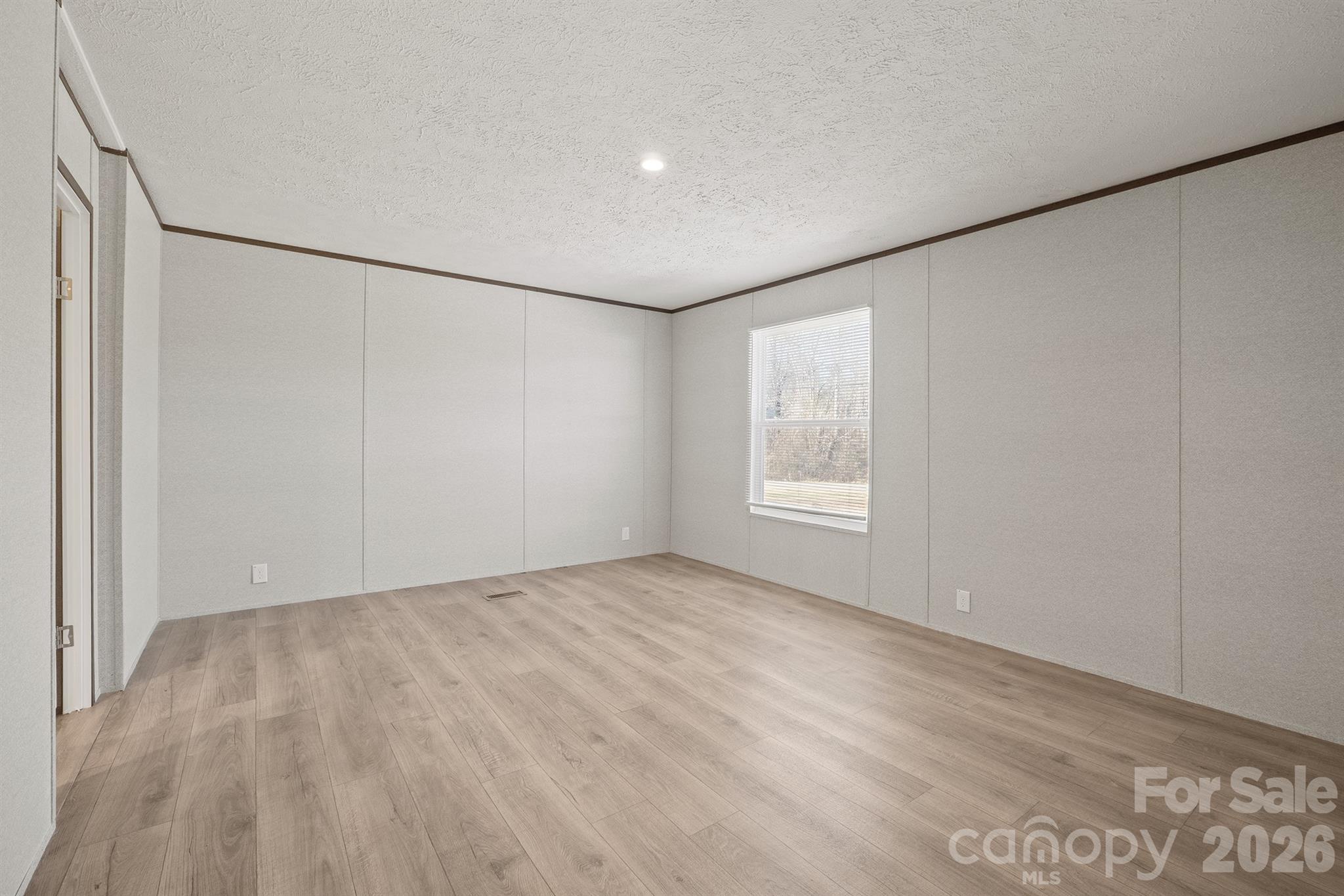 3613 Jamestown Road Morganton, NC 28655 - Photo 23 of 30 a view of an empty room with a window