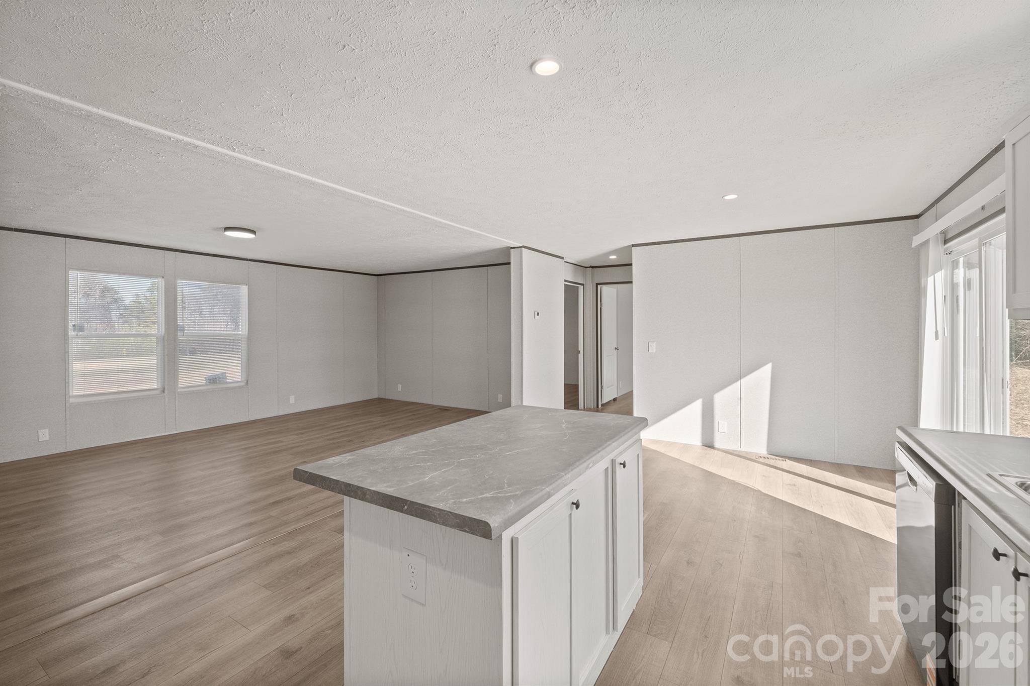 3613 Jamestown Road Morganton, NC 28655 - Photo 7 of 30 a view of entryway and hall with wooden floor