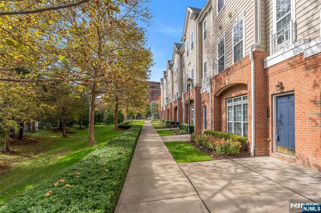 a view of a building with a yard