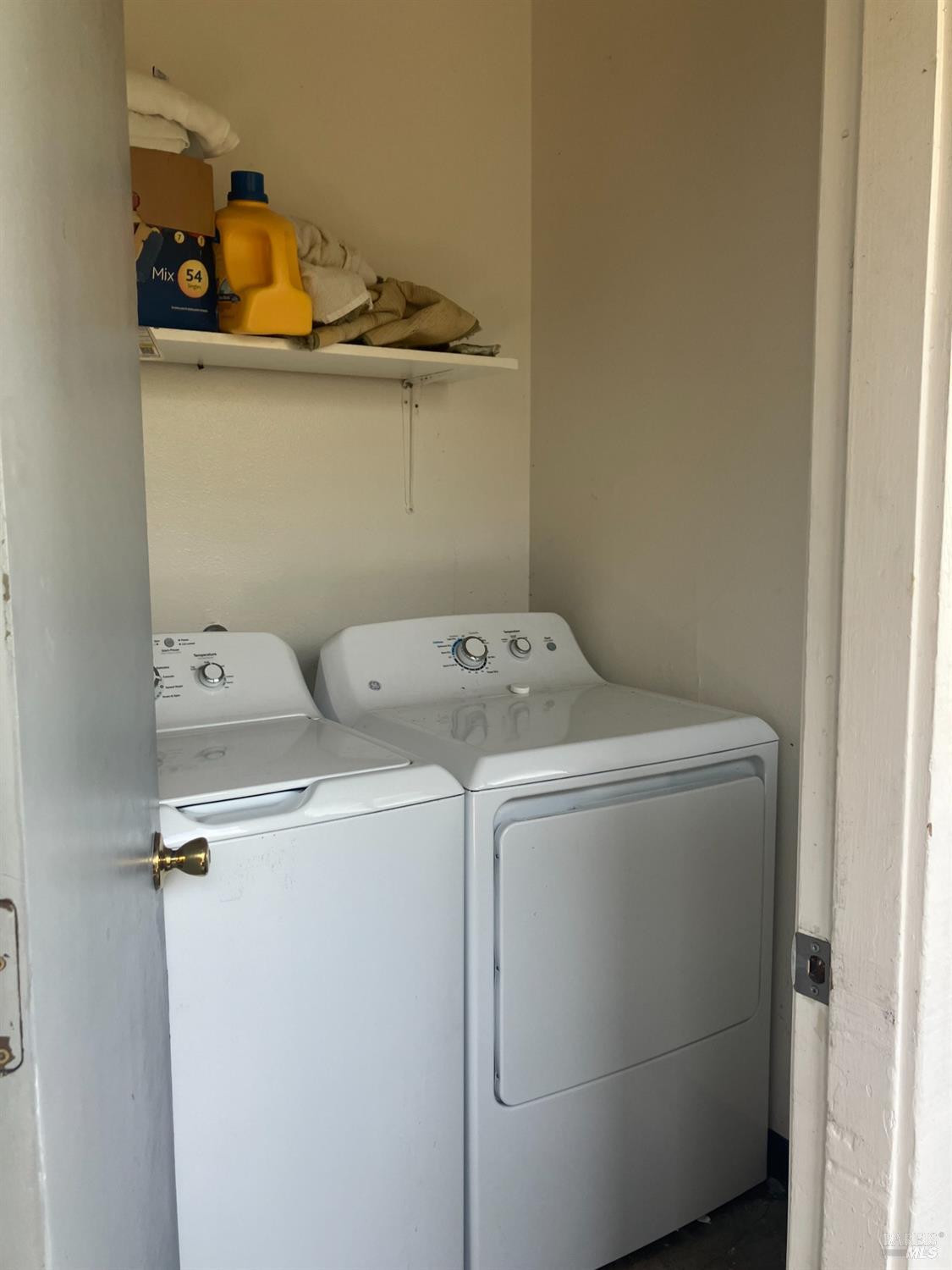 Sereno Drive Vallejo, CA 94589 - Photo 17 of 20 a utility room with dryer and washer