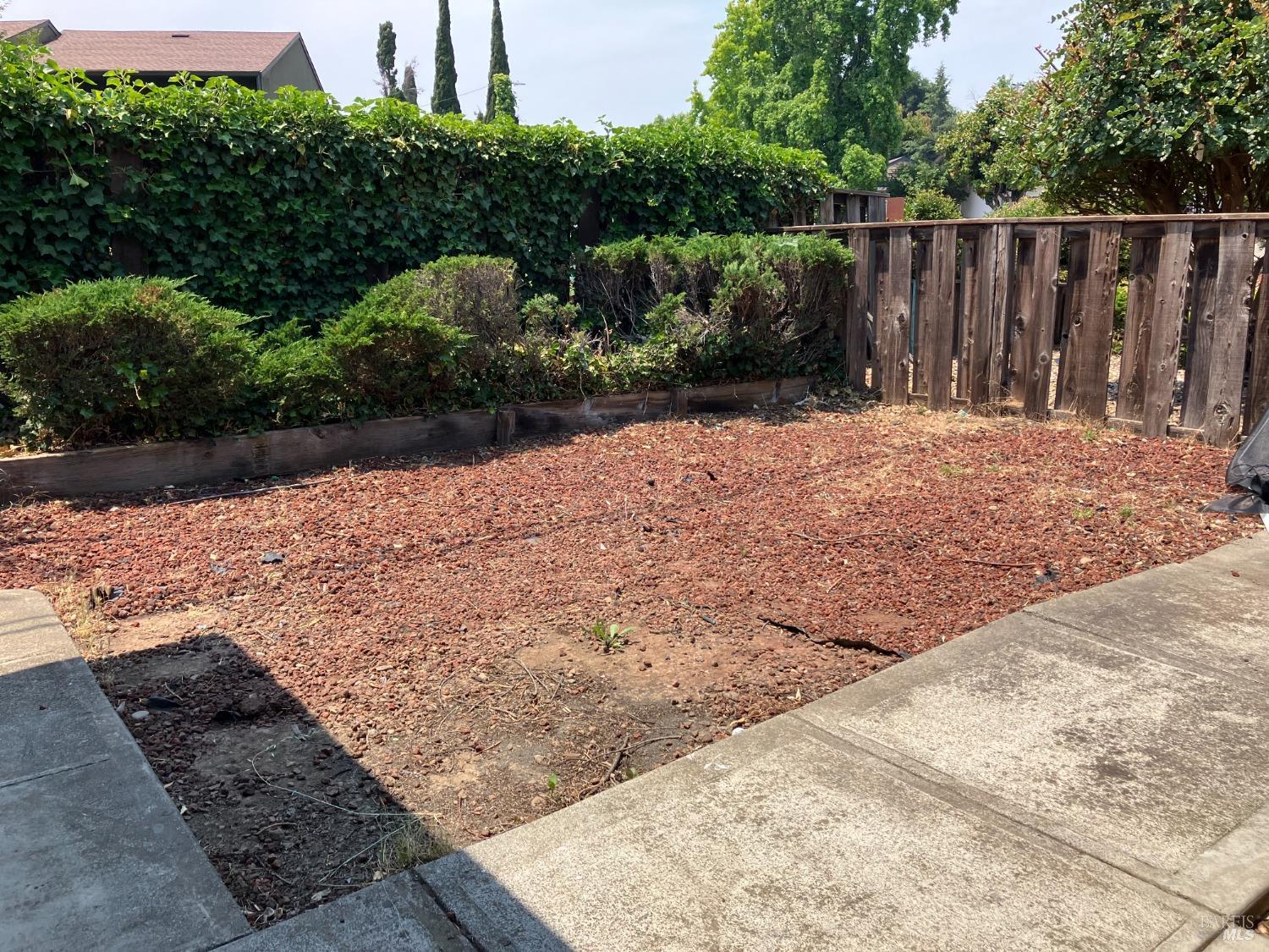 Sereno Drive Vallejo, CA 94589 - Photo 5 of 20 a view of wooden fence and trees