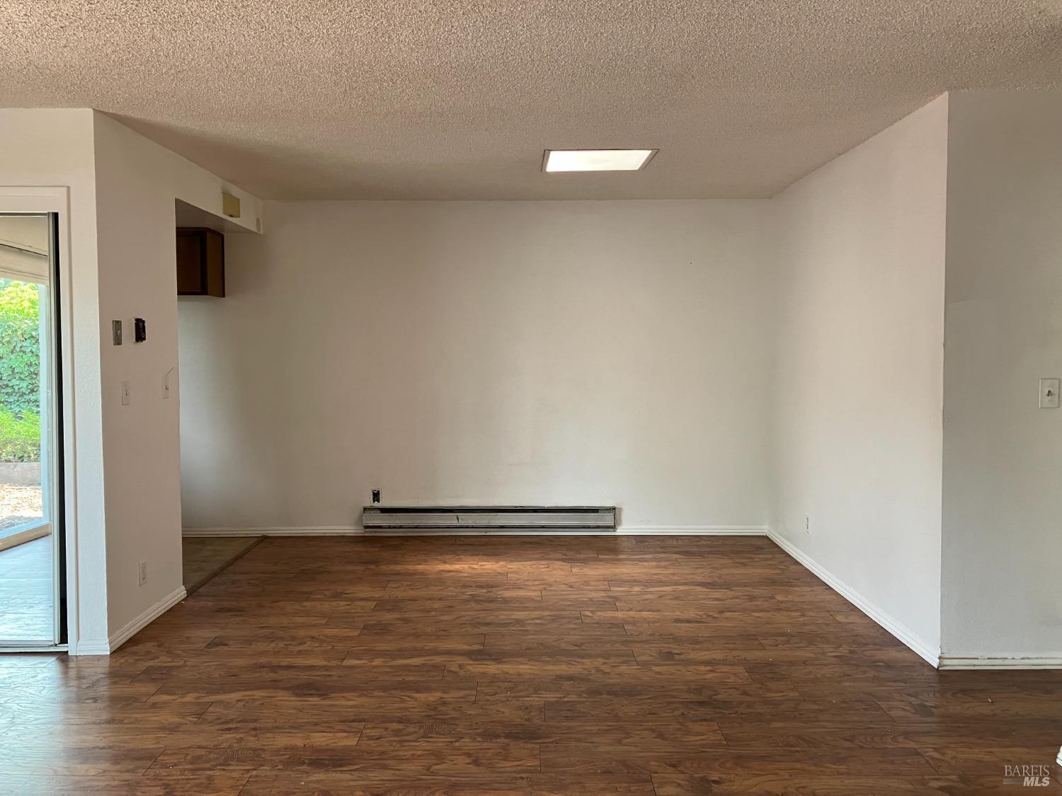 Sereno Drive Vallejo, CA 94589 - Photo 8 of 20 a view of empty room with wooden floor
