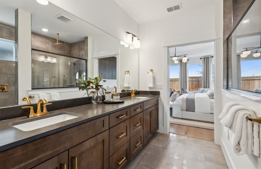 11109 Carham Street Haslet, TX 76052 - Photo 16 of 24 Owner's bath with double vanity and spacious shower *Model representation