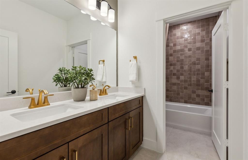11109 Carham Street Haslet, TX 76052 - Photo 23 of 24 Upgraded secondary bath with elegant finishes *Model representation