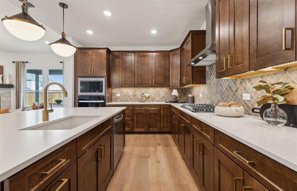 11109 Carham Street Haslet, TX 76052 - Photo 5 of 24 Open kitchen layout perfect for entertaining and creating a connected home environment *Model representation
