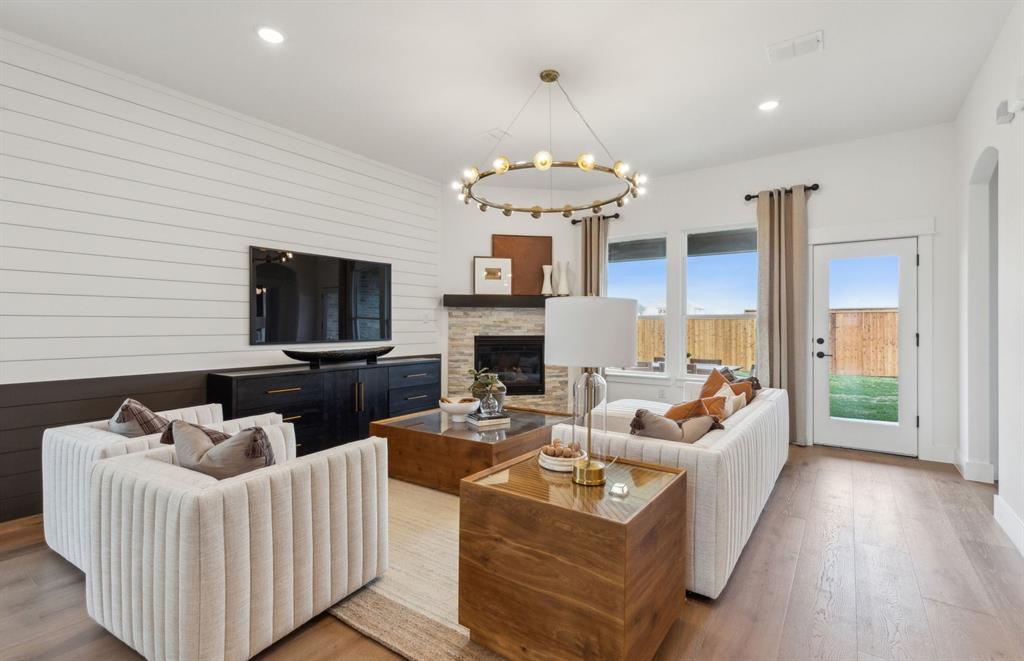 11109 Carham Street Haslet, TX 76052 - Photo 9 of 24 Open concept gathering room *Model representation