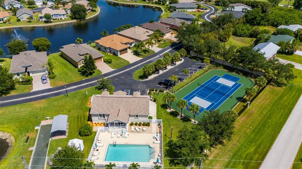 24604 Rio Villa Lakes Circle Punta Gorda, FL 33950 - Photo 22 of 28 an aerial view of a houses with yard