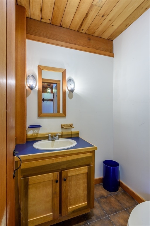20 Lawton Road Leverett, MA 01054 - Photo 18 of 39 a bathroom with a sink and a mirror