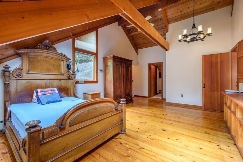 20 Lawton Road Leverett, MA 01054 - Photo 20 of 39 a bedroom with bed and wooden floor
