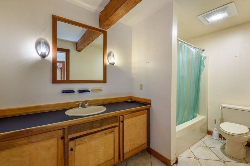 20 Lawton Road Leverett, MA 01054 - Photo 32 of 39 a bathroom with a sink a toilet and a mirror