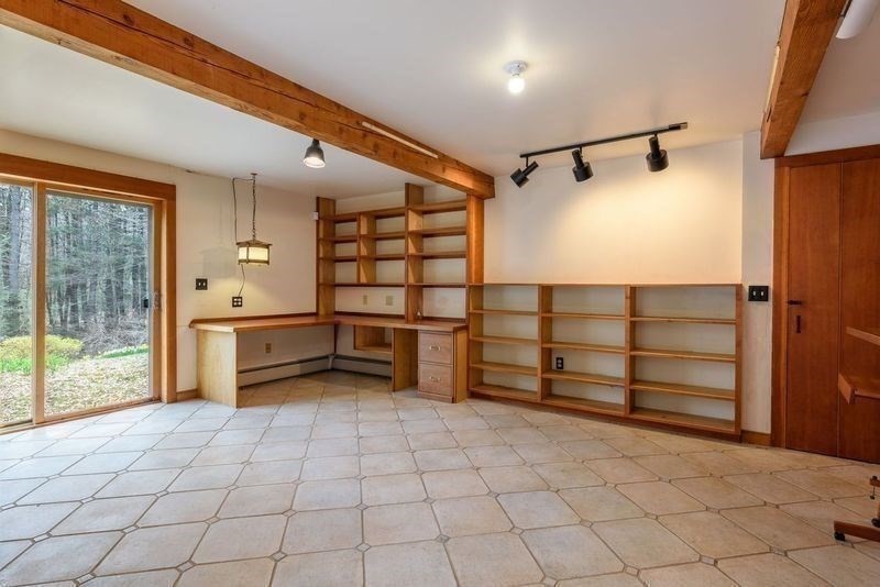 20 Lawton Road Leverett, MA 01054 - Photo 33 of 39 a view of a room with racks on the wall